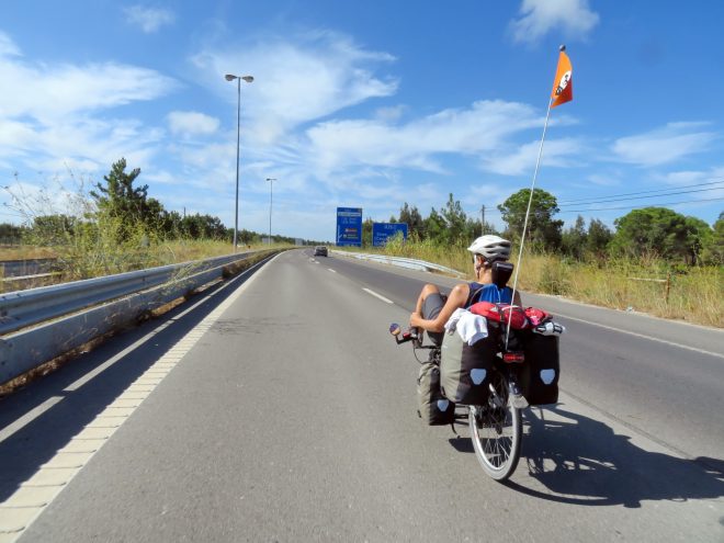 Cycling on a highway in Portugal